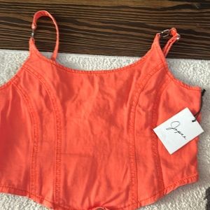 NEW WITH TAGS ! Women’s small coral colored crop top